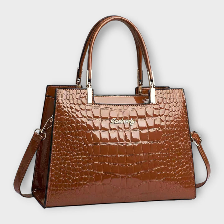 Cécile. - Sac brillant avec motif crocodile