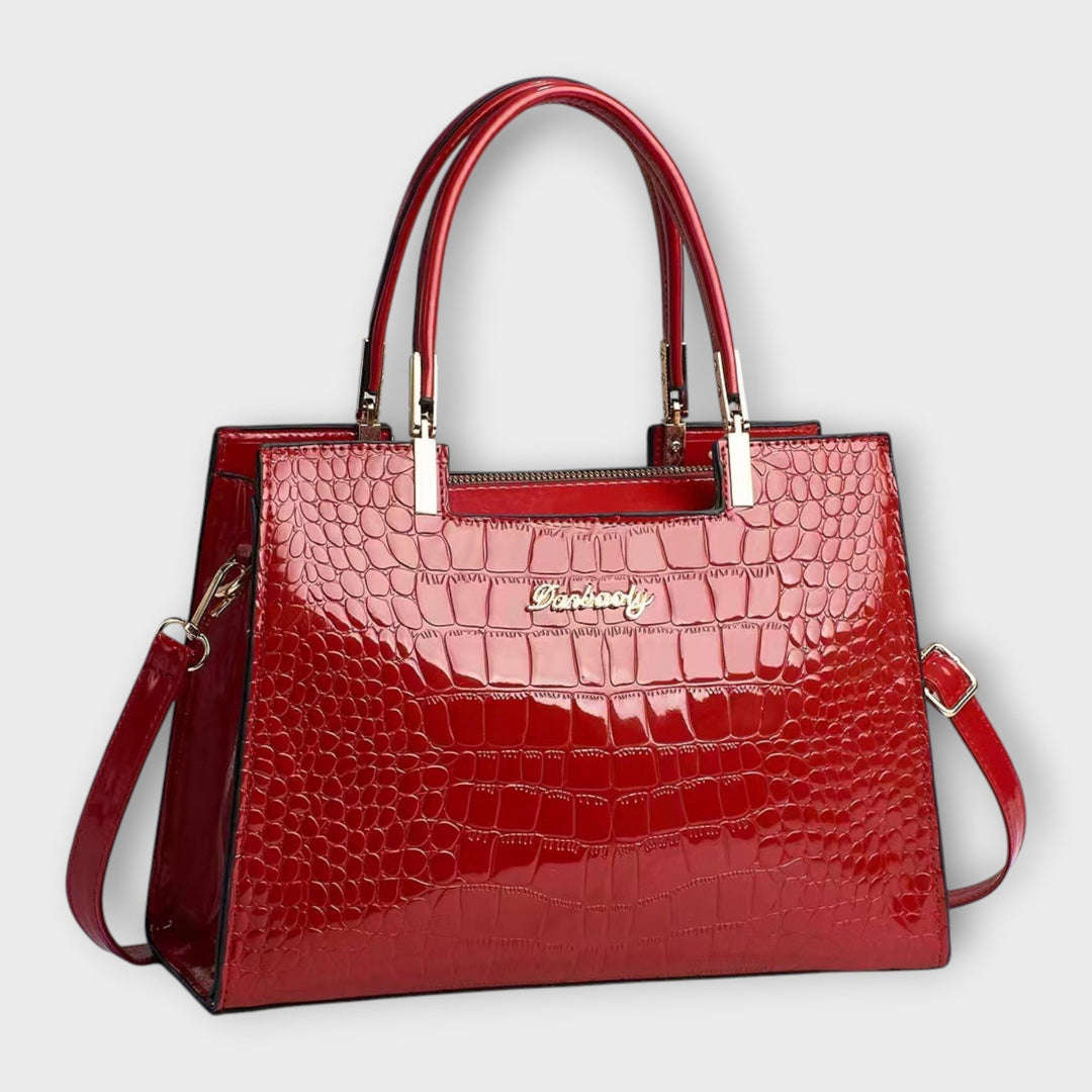Cécile. - Sac brillant avec motif crocodile