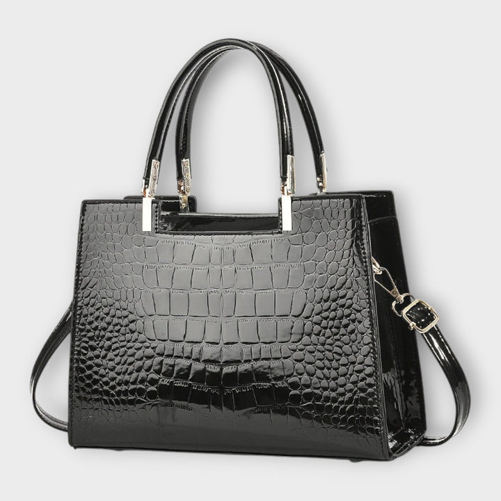 Cécile. - Sac brillant avec motif crocodile